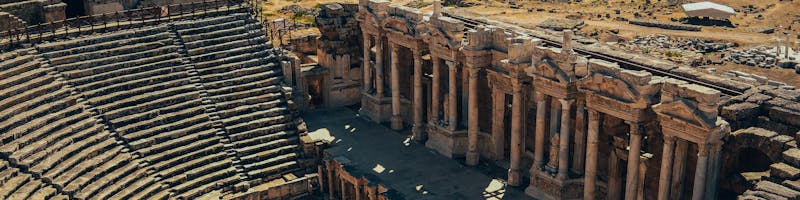 Stunning view of the ancient Roman amphitheater in Hierapolis, Turkey's Pamukkale region.