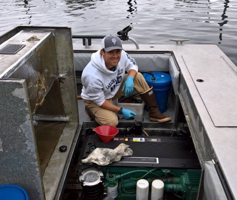 Man repairs a boat