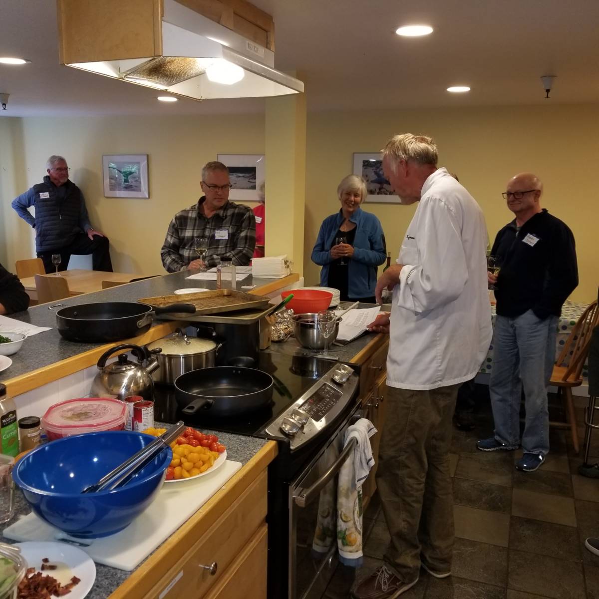 chef ludger cooking in kitchen in front of client audience