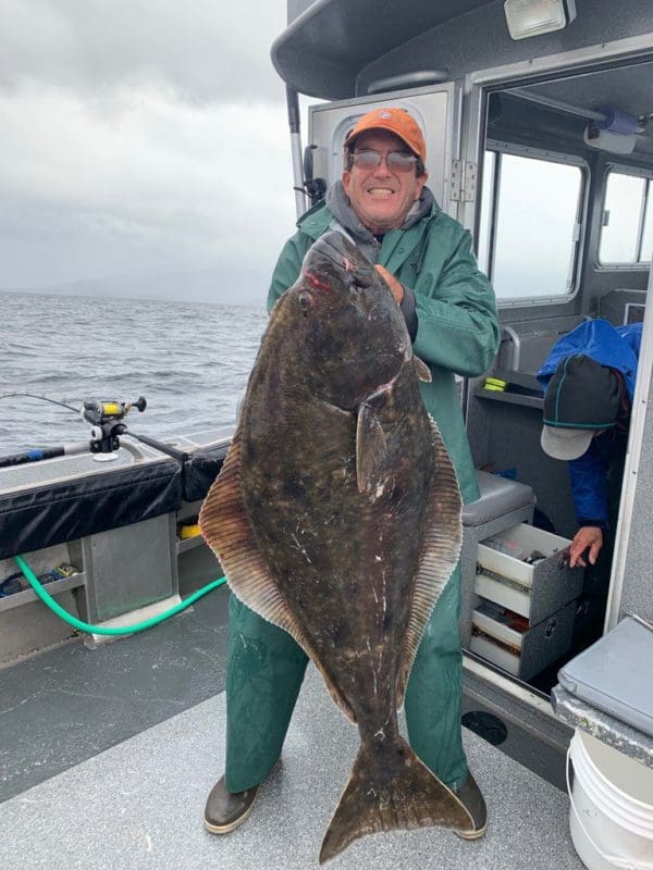 Matt McCarthy with a 49.5 in halibut taken on inside waters.