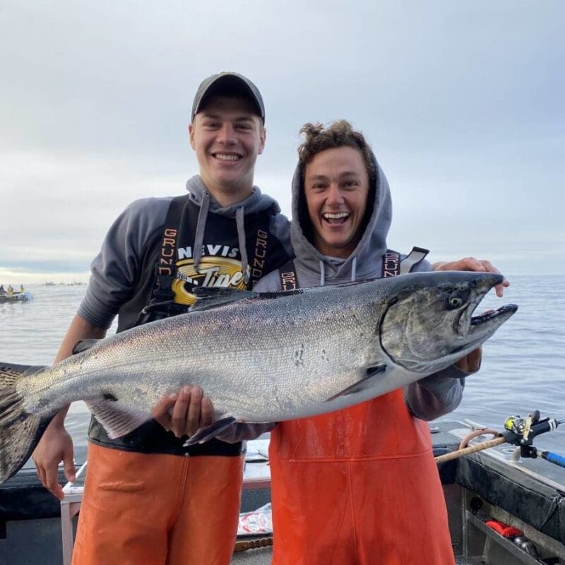 Jack McNAmee and Matthew Barr with husky August king salmon