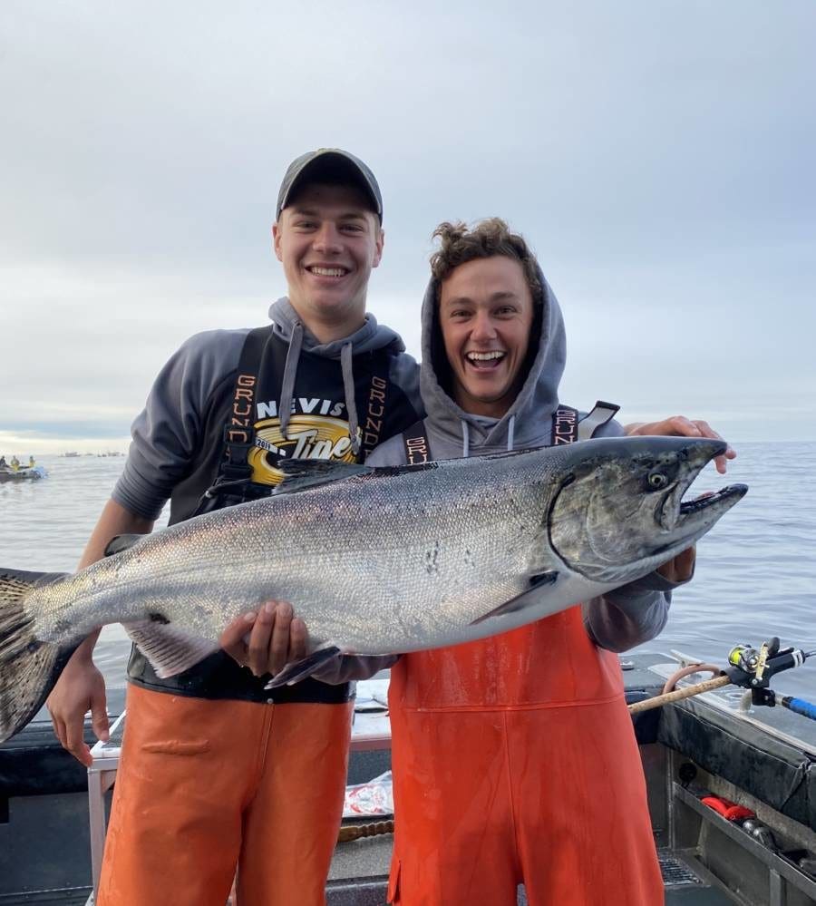 Jack McNAmee and Matthew Barr with husky August king salmon