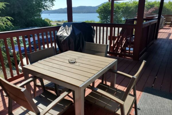 Patio overlooking the water of a lodging accommodation in Sitka, Alaska
