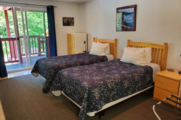 Bedroom of a waterview suite in Sitka, Alaska