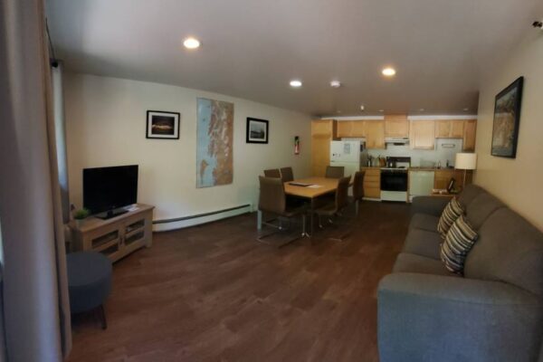 Living room and kitchen of a waterview suite in Sitka, Alaska