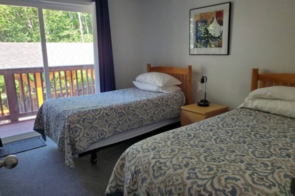 Bedroom of a waterview suite in Sitka, Alaska