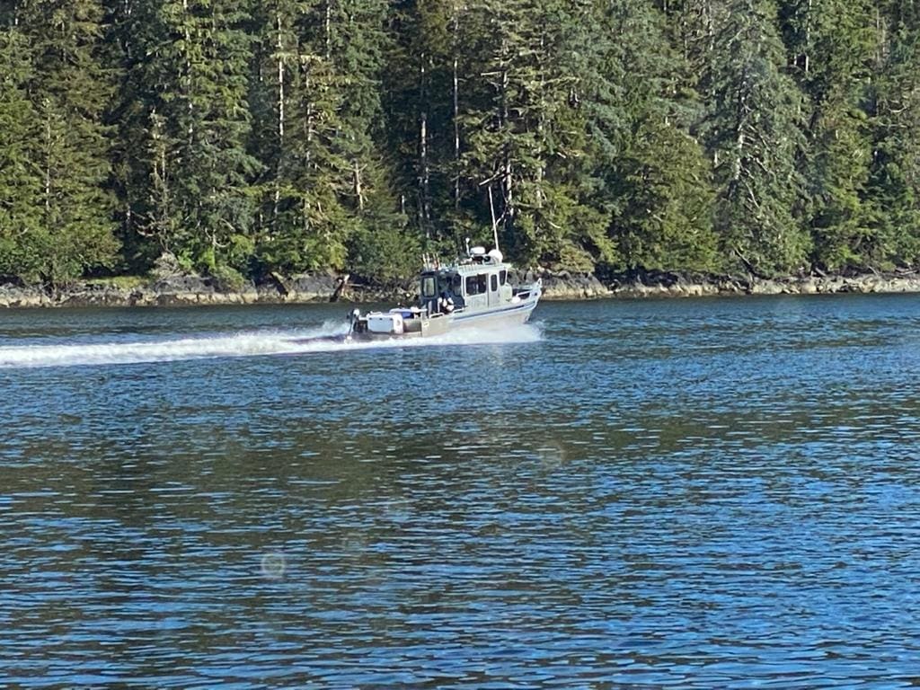 Angling Unlimited fishing boat drives quickly in Sitka, Alaska