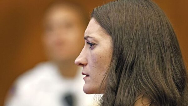 Lindsay Clancy watches as her ex-husband Patrick Clancy takes the witness stand on Monday, July 27, 2026, in Plymouth Superior Court in Plymouth, Mass.