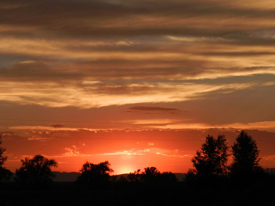 Jenni Ivie Ricks Poulter. rapidly changing sunset west of Rexburg. July 14 2017