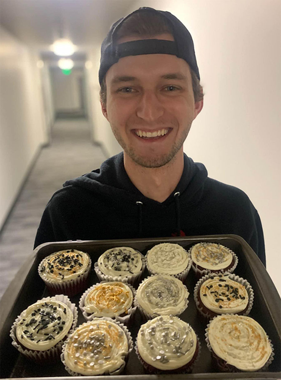 Caleb Galke with cupcakes