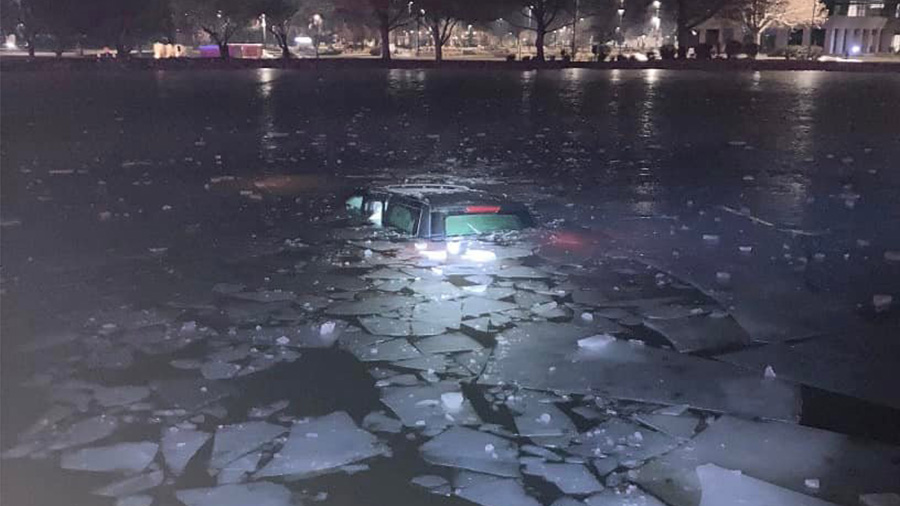 SUV icy pond