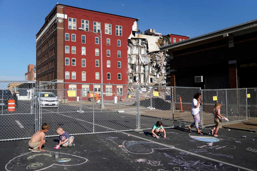 Officials weigh more searches as 5 missing in partial apartment collapse in Iowa
