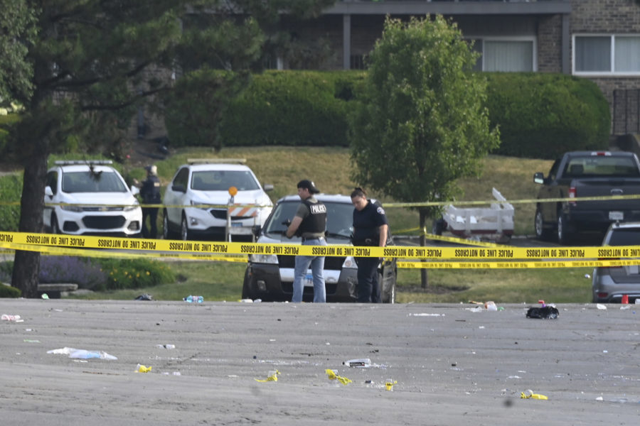 Parking lot party shooting leaves 1 dead and 22 people hurt in suburban Chicago