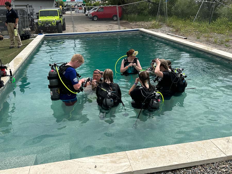 Teens learn about SWAT team, how to dive and shoot guns at law enforcement camp