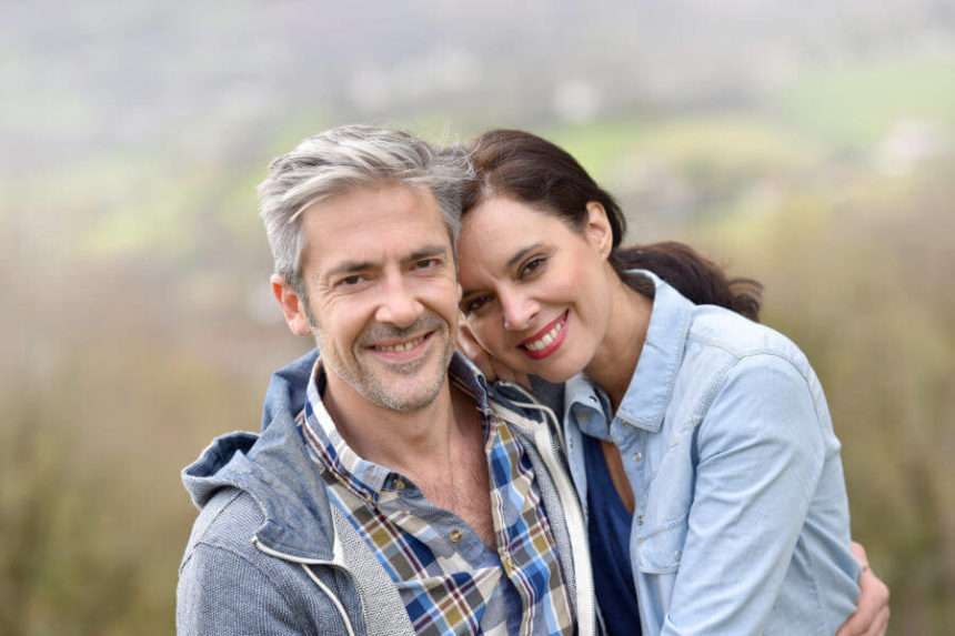 cheerful middle-aged couple