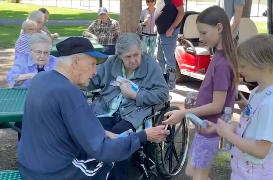Seniors delight kids at water park with ice cream treats