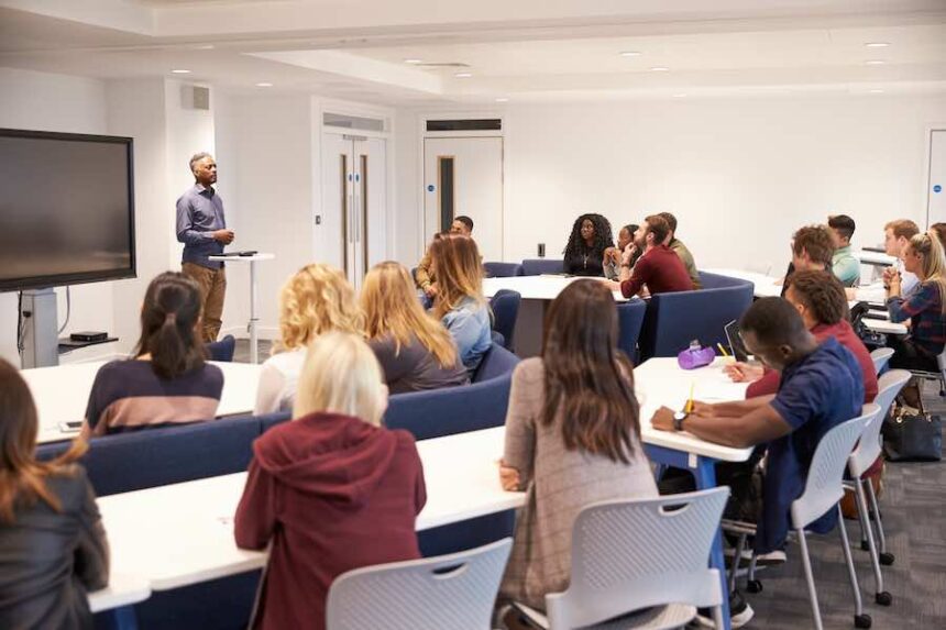 University students study in a classroom with male lecture