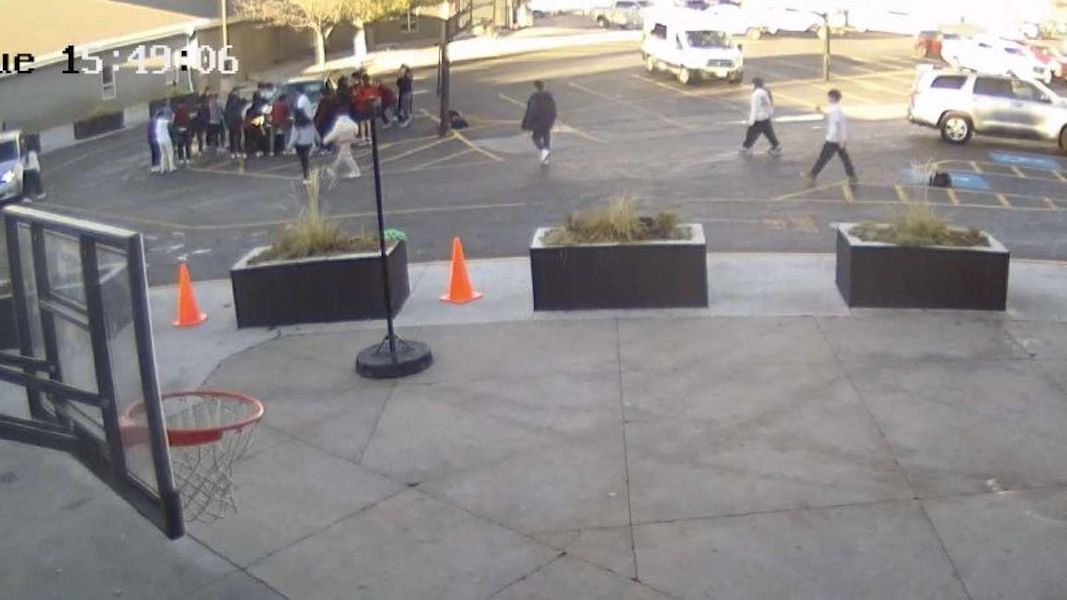 Students help lift vehicle off a mom and two kids pinned by a car