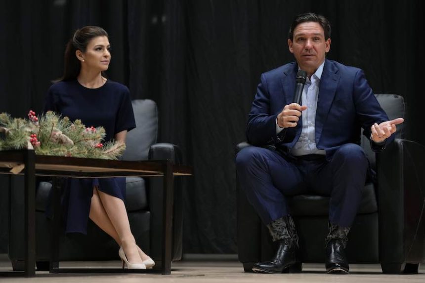 Republican presidential candidate Florida Gov. Ron DeSantis speaks as his wife Casey, left, looks on