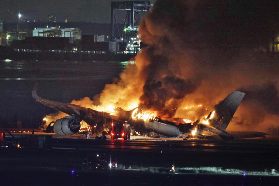 Planes collide and catch fire at Japan’s busy Haneda airport, killing 5. Hundreds evacuated safely.