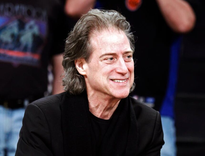 Comedian Richard Lewis attends an NBA basketball game in Los Angeles on Dec. 25, 2012. Lewis, an acclaimed comedian known for exploring his neuroses in frantic, stream-of-consciousness diatribes while dressed in all-black, leading to his nickname “The Prince of Pain,” has died. He was 76. He died at his home in Los Angeles on Tuesday night after suffering a heart attack, according to his publicist Jeff Abraham. (AP Photo/Alex Gallardo, File)