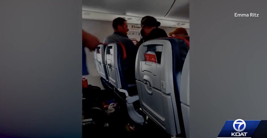 American Airlines flight forced to return to Albuquerque after a man tried to open the emergency exit, passengers say