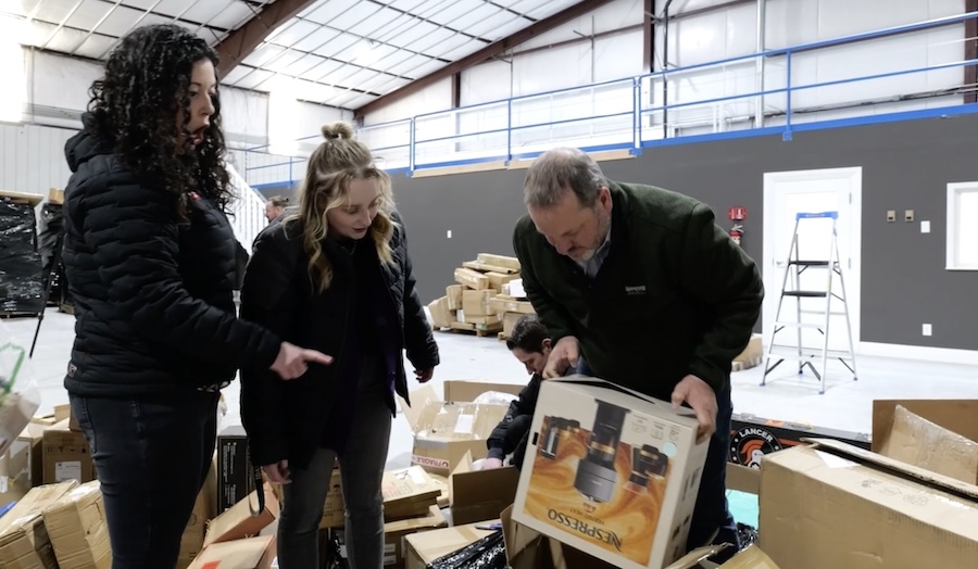 This new business lets you buy pallets stacked with stuff from online stores. We went and unboxed a pallet.