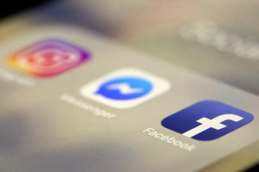 In this March 13, 2019, file photo Facebook, Messenger and Instagram apps are are displayed on an iPhone in New York. A group of 40 state attorneys general sent a letter to Instagram and Facebook parent company Meta expressing concern over what they say is dramatic uptick of consumer complaints about account takeovers and lockouts. The AGs called on Meta to do a better job preventing account takeovers. (AP Photo/Jenny Kane, File)