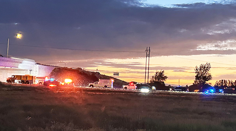 Large response to vehicle crash and fire at Sugar City overpass