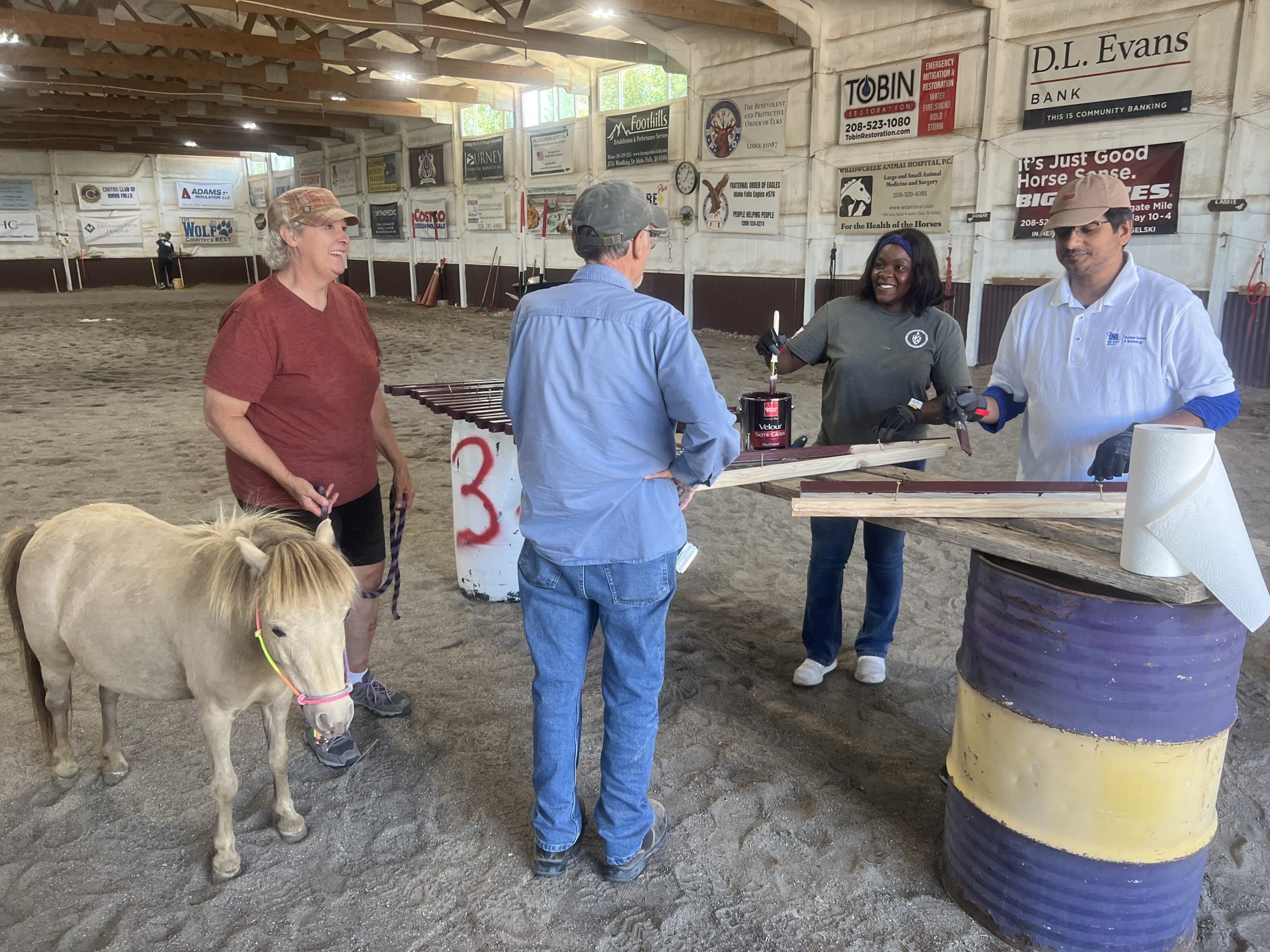 Saddle up! Idaho National Laboratory employees volunteer at Champ’s Heart.