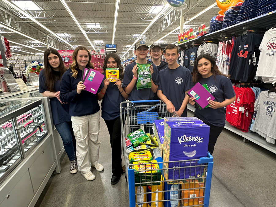 Local teens and law enforcement get needed supplies for local schools 