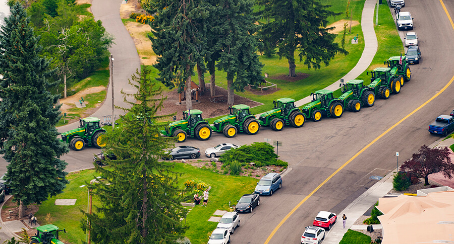 PHOTO GALLERY | Convoy of farmers on tractors drives through Idaho Falls to attend meeting with governor