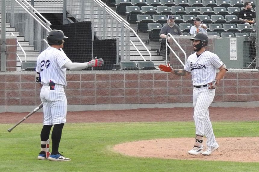 Jablonski high-five Wyatt following homer