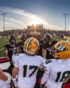 Hillcrest and Bonneville captains meet for the first coin toss at Westmark Stadium Friday night. | Scott Kirtley, EastIdahoNews.com