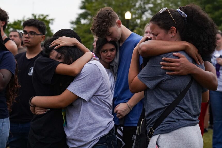 Community members, students, and faculty of Apalachee High School come together for a vigil on September 6 in Monroe, Georgia. | Megan Varner, Getty Images via CNN Newsource