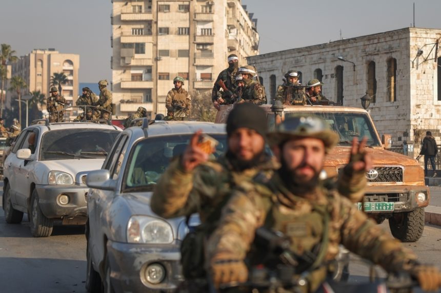 Syrian opposition fighters ride along the streets in the aftermath of the opposition's takeover of Hama, Syria, Friday, Dec. 6, 2024. | Ghaith Alsayed, Associated Press