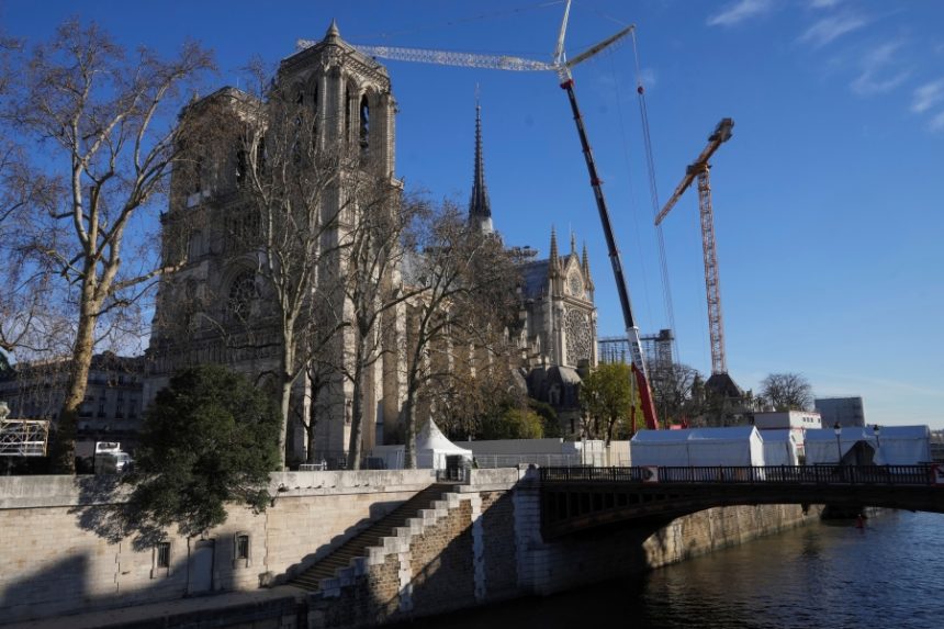 Cranes are seen by Notre-Dame cathedral, Thursday, Nov. 28, 2024 in Paris. | Michel Euler, Associated Press