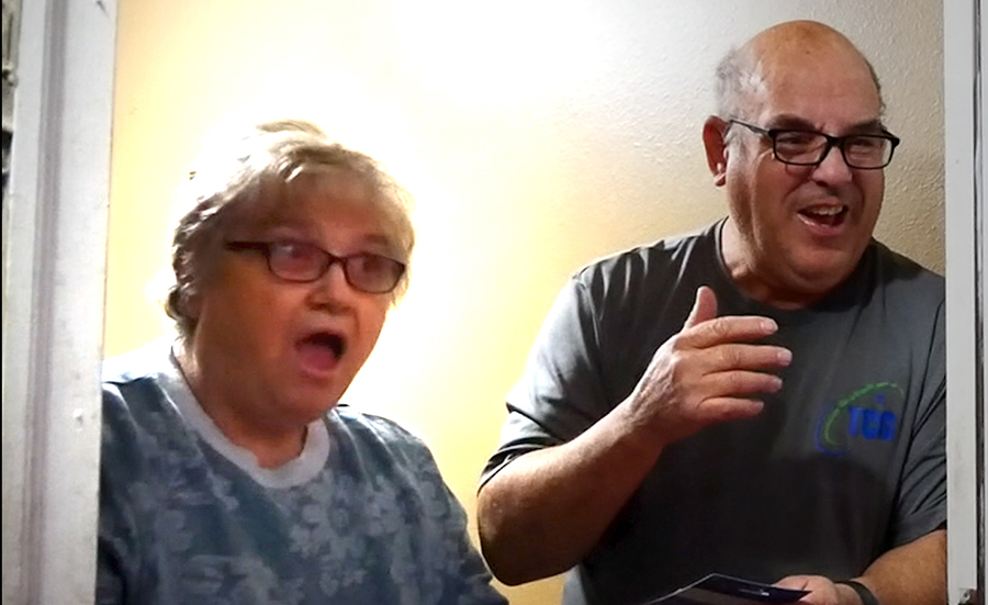 Deaf couple always serving others is stunned when a Secret Santa has a gift for them