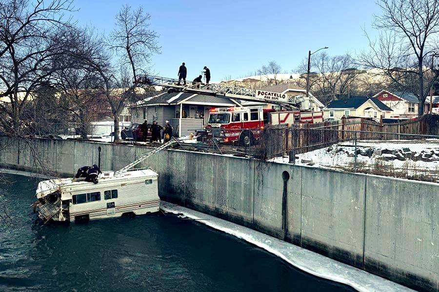 RV crashes into Portneuf River with two adults and a dog inside