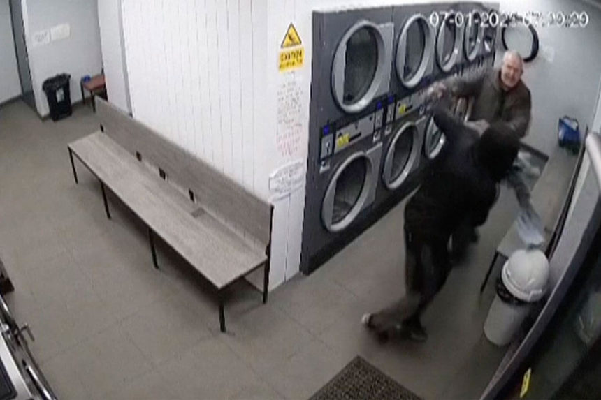 man defends himself with trousers