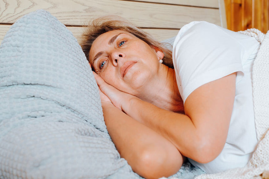 woman having trouble sleeping