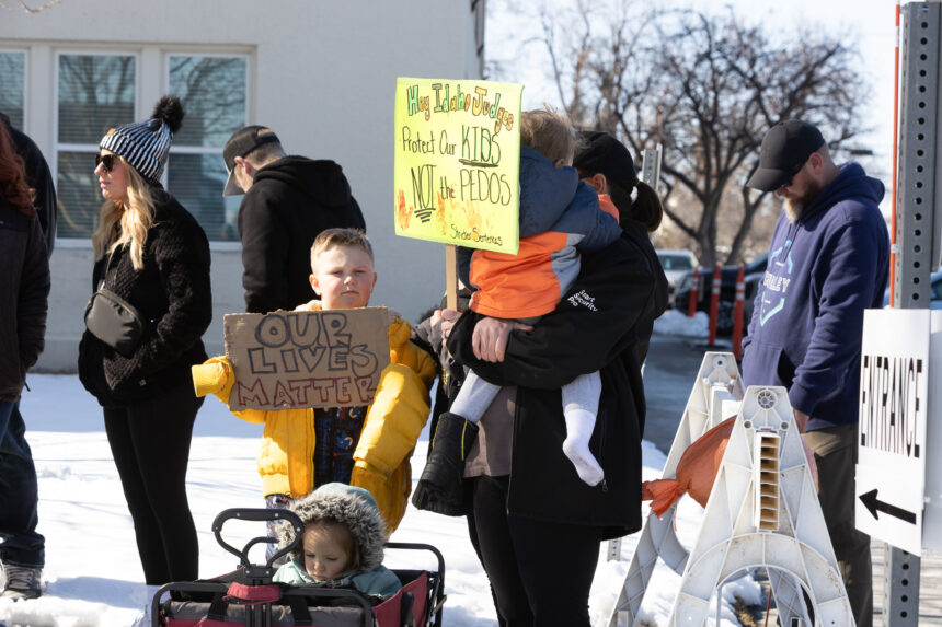 A child outside of the Bonneville County Courthouse holding a sign stating, “Our lives matter.” | Daniel V. Ramirez, EastIdahoNews.com