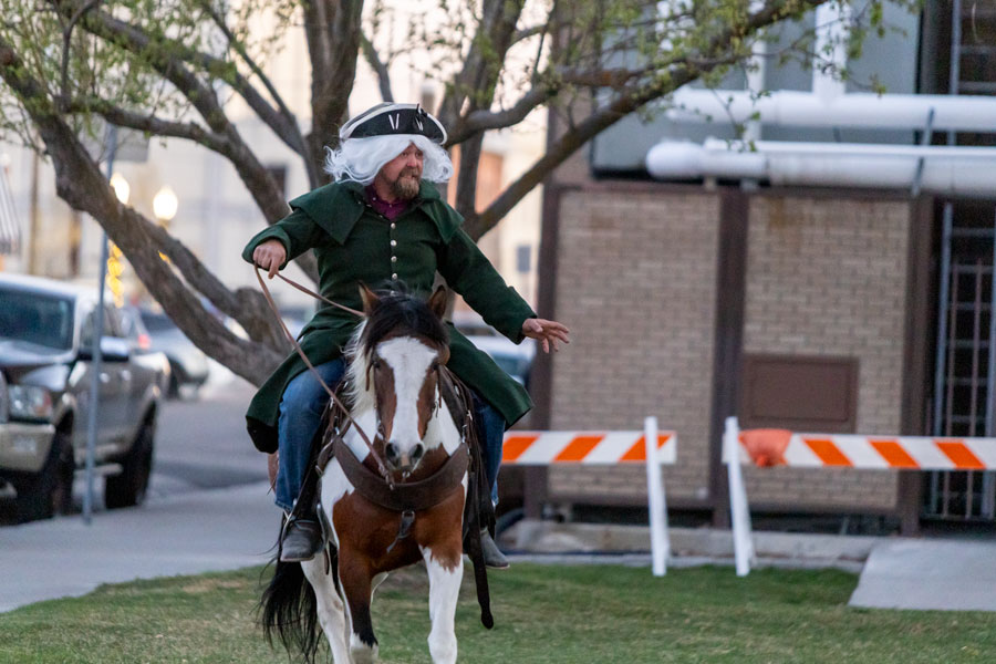 Bonneville County Superintendent of Weed Control Jud Elkington riding through the lawn of the county courthouse screaming, "the British are coming!" | Daniel V. Ramirez, EastIdahoNews.com