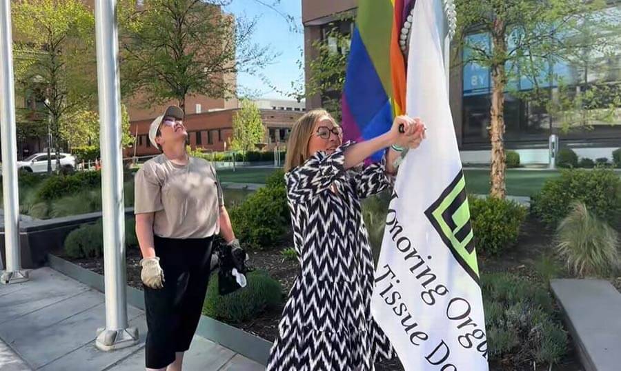 conservative activists cover Boise pride flag