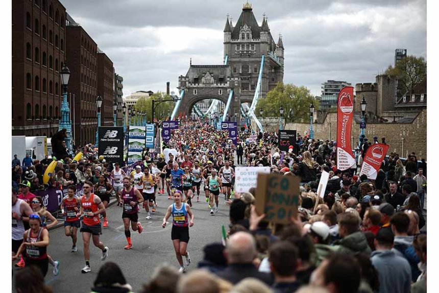 This year's London Marathon is expected to break the world record for the most participants ever in a marathon. Mandatory Credit: Henry Nicholls/AFP/Getty Images/File via CNN Newsource