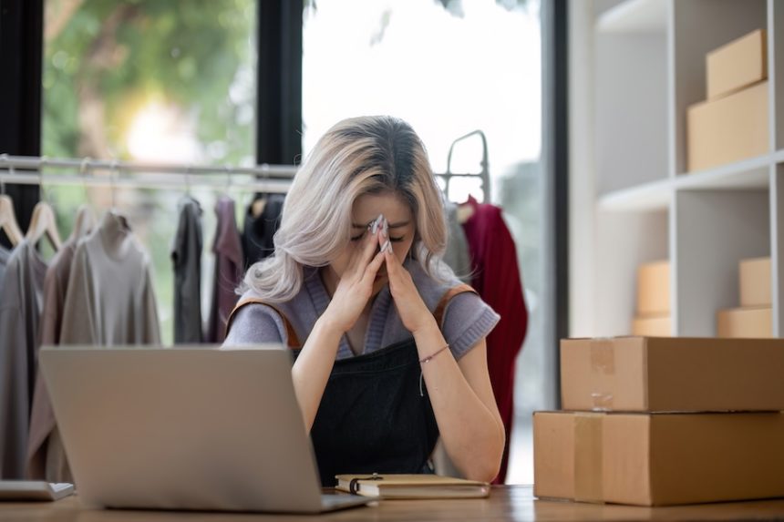 stress serious asian woman doing clothing business 2025 01 16 13 14 48 utc