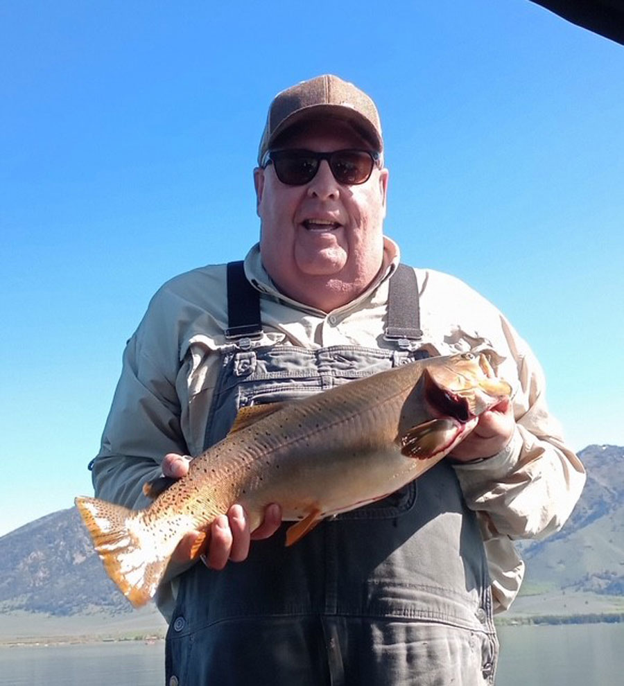 Mike Bruton of Rigby with a Hybrid just under six pounds taken on Memorial Day on Henrys Lake.
