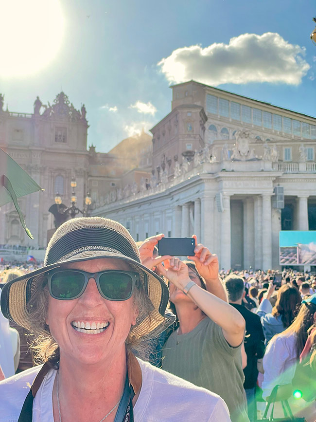 Shannon Rood of Idaho Falls posing for a photo in Rome last week as white smoke signaling the selection of a new pope emerges from the Sistine Chapel. | Courtesy Shannon Rood
