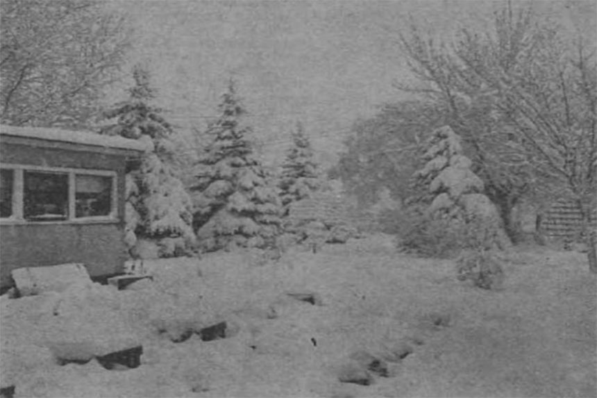 Backyard evidence of heavy fall of snow on Sunday (May 15, 1955, in Rigby). Snow here in town was measured nine to 10 inches at the end of the storm Sunday noon. Caption dated May 16, 1955.