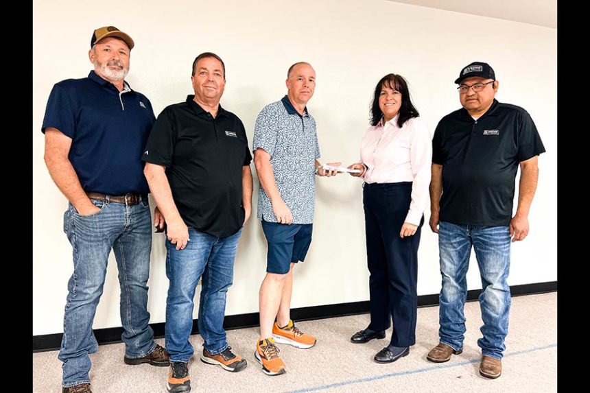 Pictured left to right - Wyatt Croft (Bingham), Jim Grauberger (Bingham), Pastor Thompson, Diane Carey (Bingham), Victor Gonzalez (Bingham))